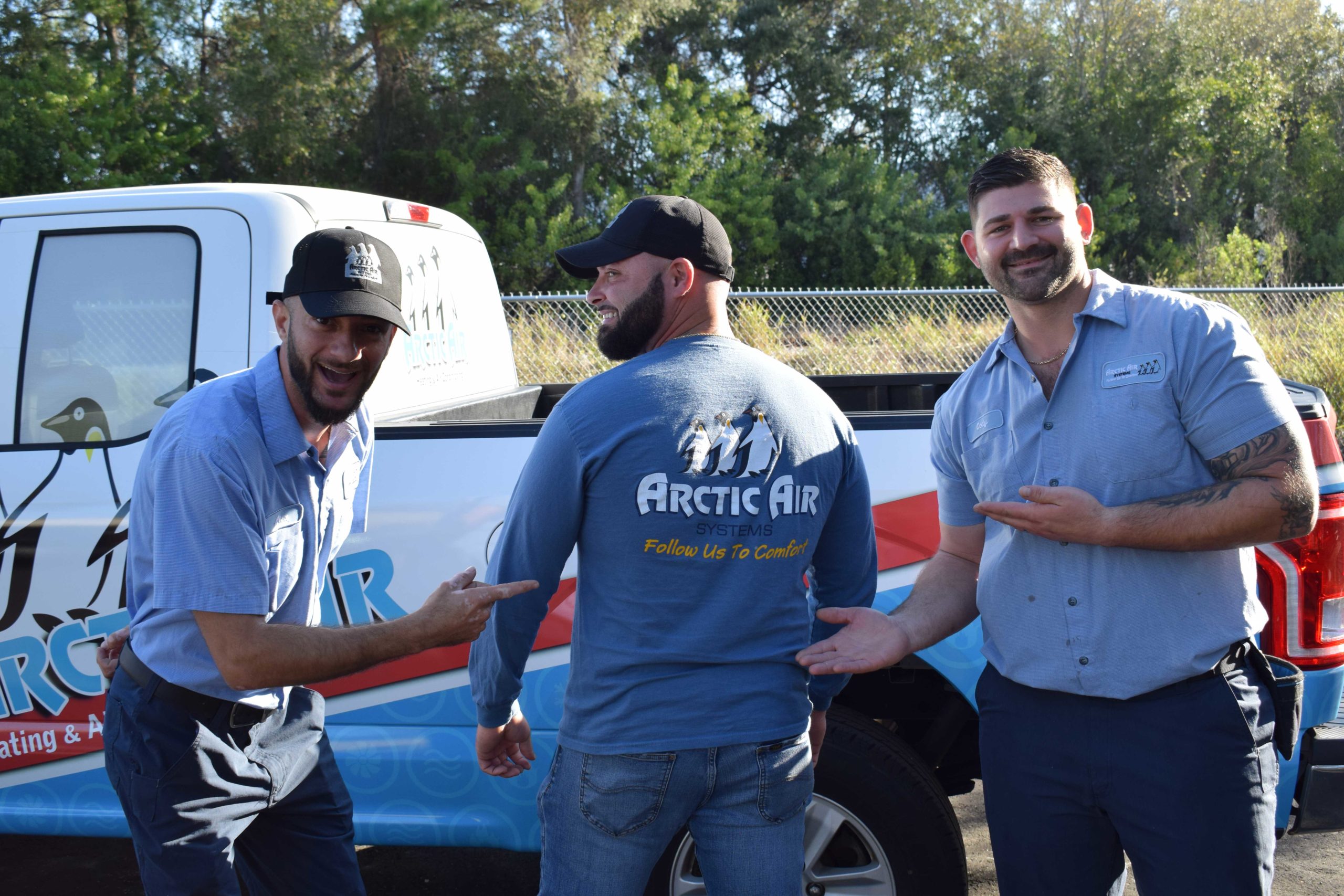 Team Members around van