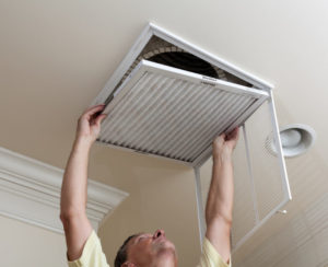 Man Changing Air Filter