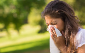 Woman Blowing Nose