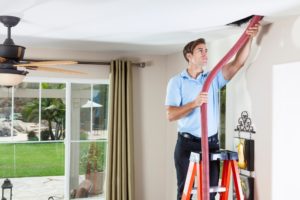 Man Cleaning Ducts